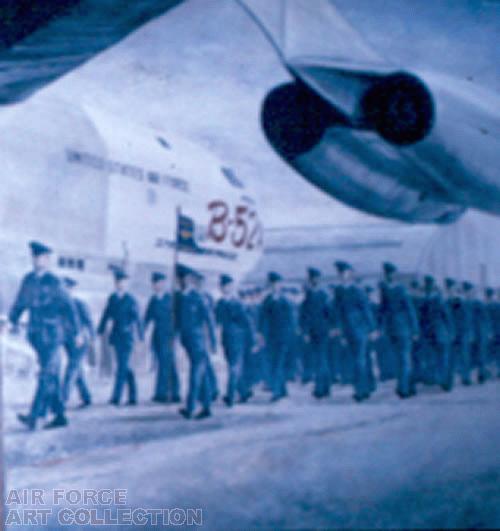 TROOPS MARCHING UNDER B-52 WING